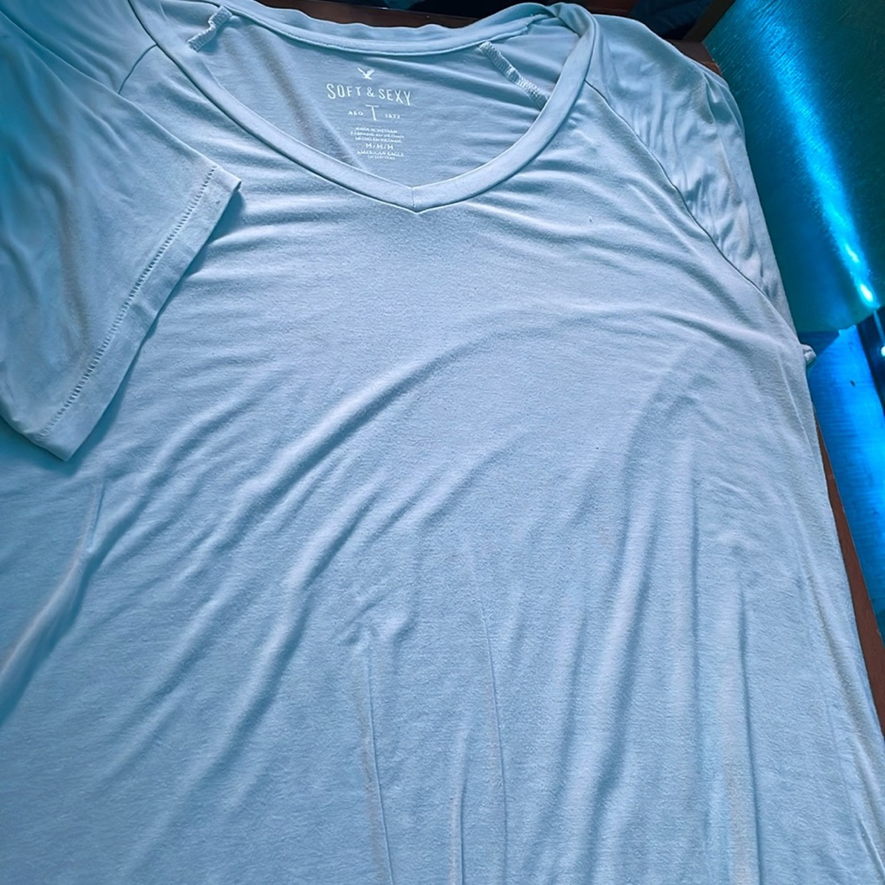 very light blue stretchy and very comfortable tee shirt